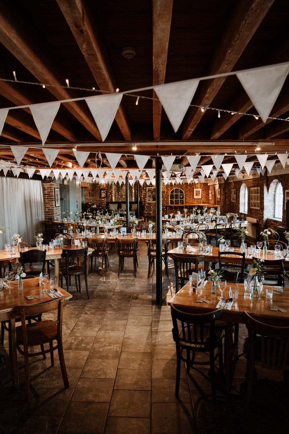 Barn Reception Decor Bunting Whitstable Beach Wedding Nicola Dawson Photography