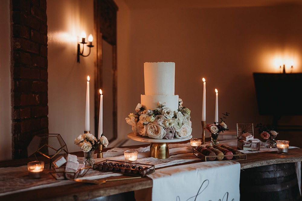 Cake Table Flowers Candles Macrons Winter Wonderland Barn Wedding Thyme Lane Photography