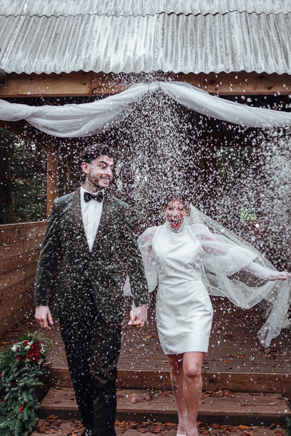 Snow Confetti Bride Groom Christmas Wedding Theme Idea Naomi Mills Photography
