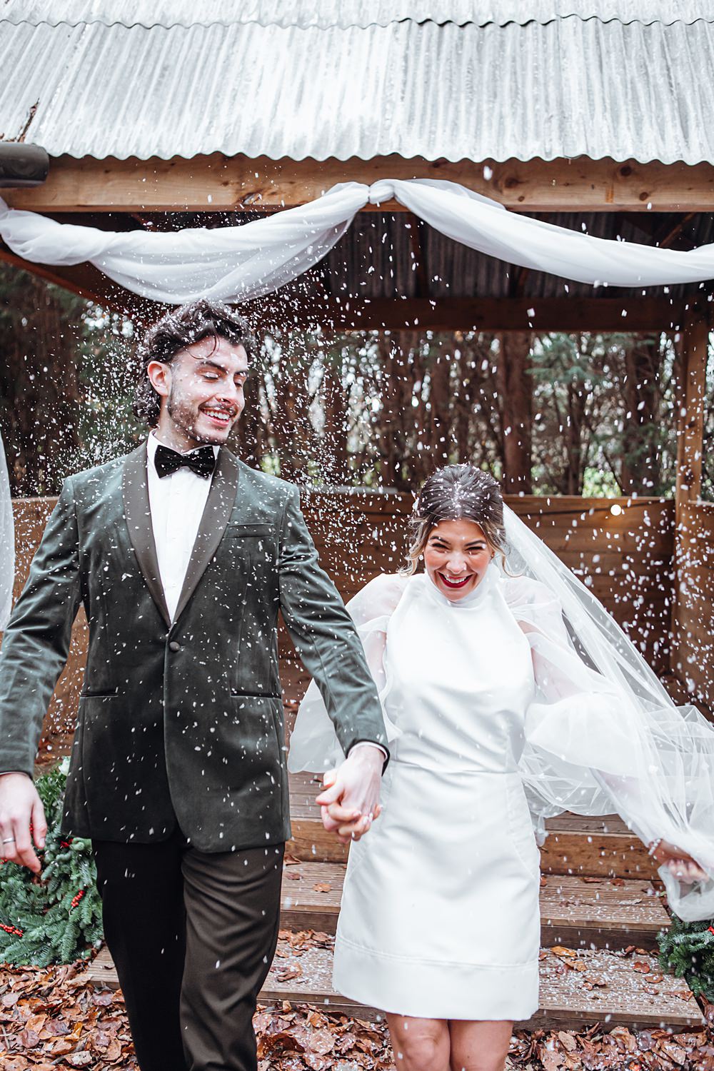 Snow Confetti Bride Groom Christmas Wedding Theme Idea Naomi Mills Photography