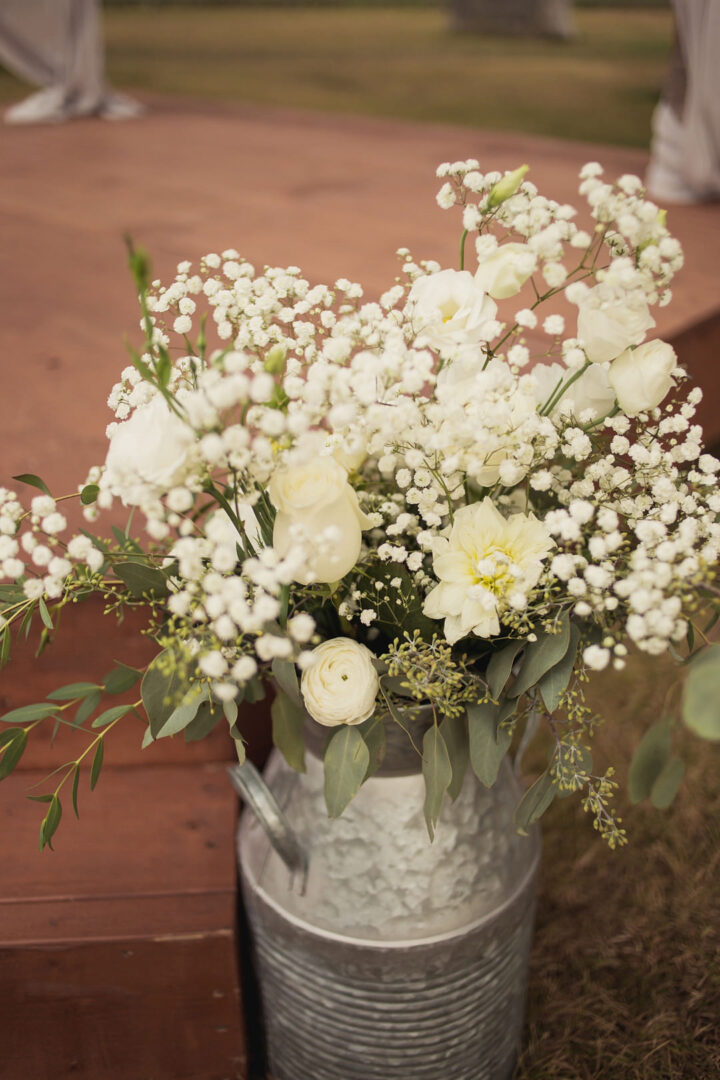 White Milk Churn Wedding Flowers Tied Photo & Film