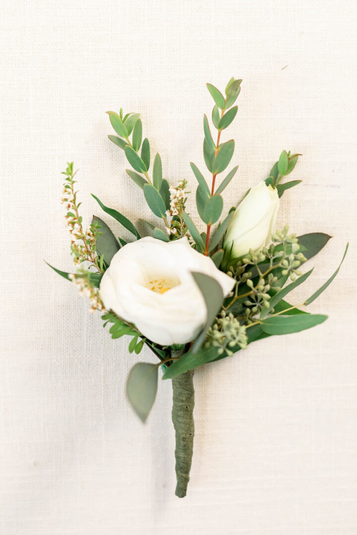 White Wedding Flower Buttonhole Nicole Miro Photography LLC
