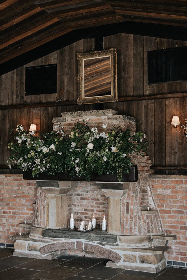 White Wedding Flowers Fireplace Matt Horan Photography