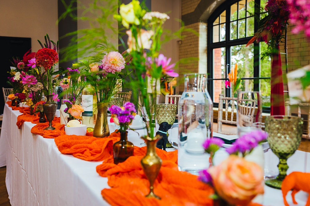 Top Table Flowers Orange Runner Faerie Tea Party Wedding Kirsty Rockett Photography