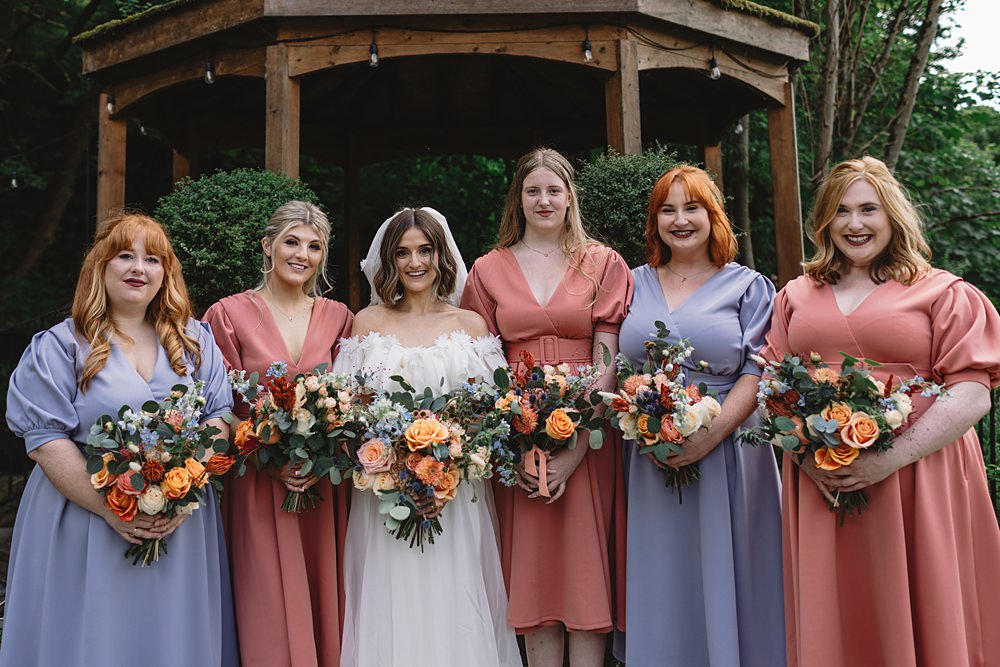 Coral Lilac Bridesmaid Dresses Streamers Wedding Decor Louise Barry Photographer