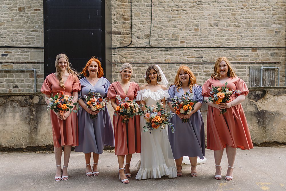 Coral Lilac Bridesmaid Dresses Streamers Wedding Decor Louise Barry Photographer