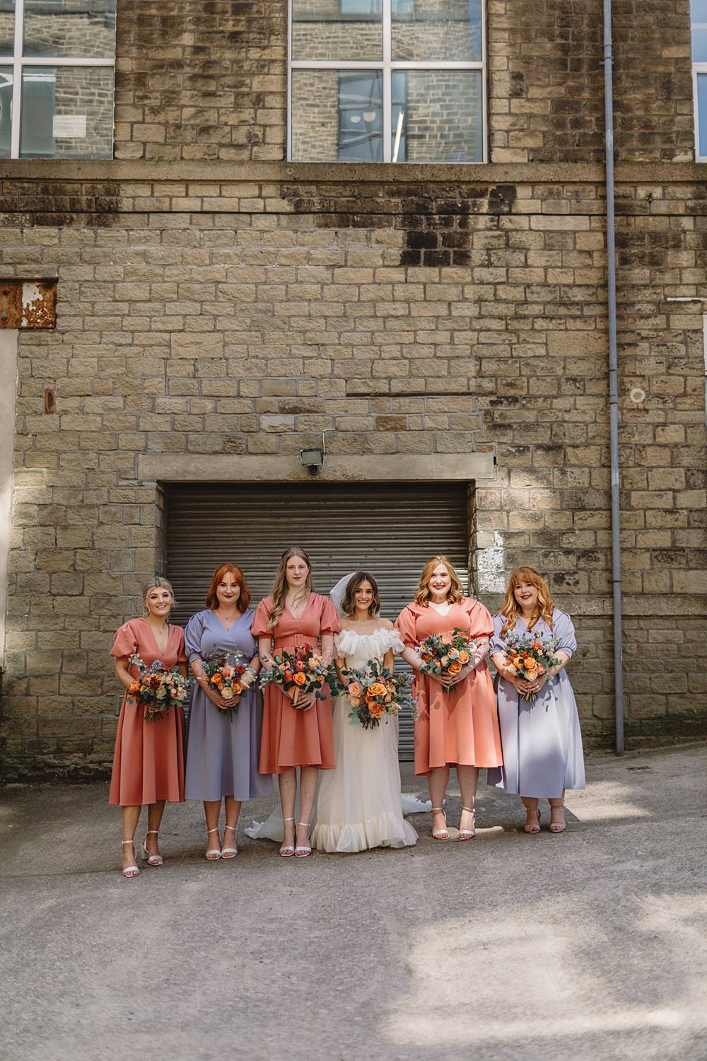 Coral Lilac Bridesmaid Dresses Streamers Wedding Decor Louise Barry Photographer