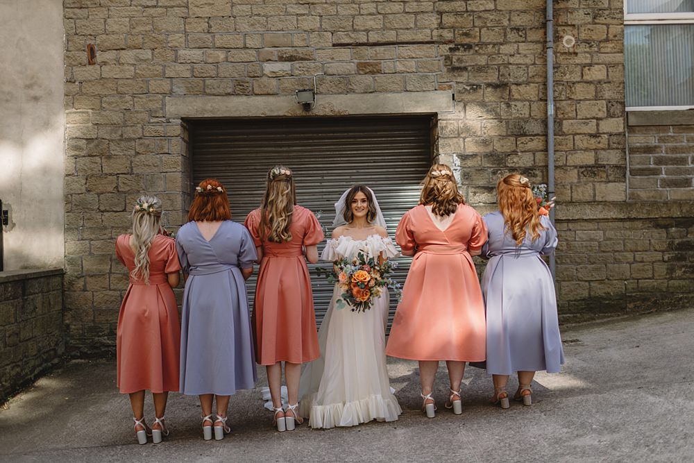 Coral Lilac Bridesmaid Dresses Streamers Wedding Decor Louise Barry Photographer