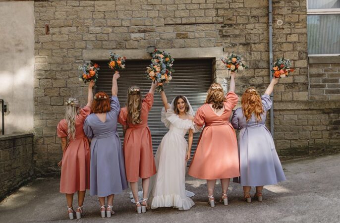 Coral Lilac Bridesmaid Dresses Streamers Wedding Decor Louise Barry Photographer