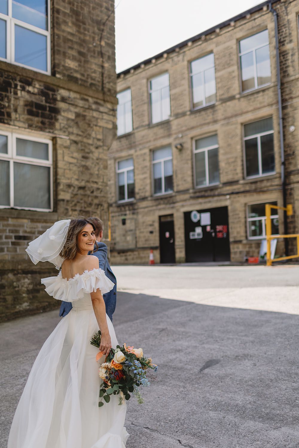 Dress Gown Off Shoulder Ruffle Bride Freda Bennet Streamers Wedding Decor Louise Barry Photographer