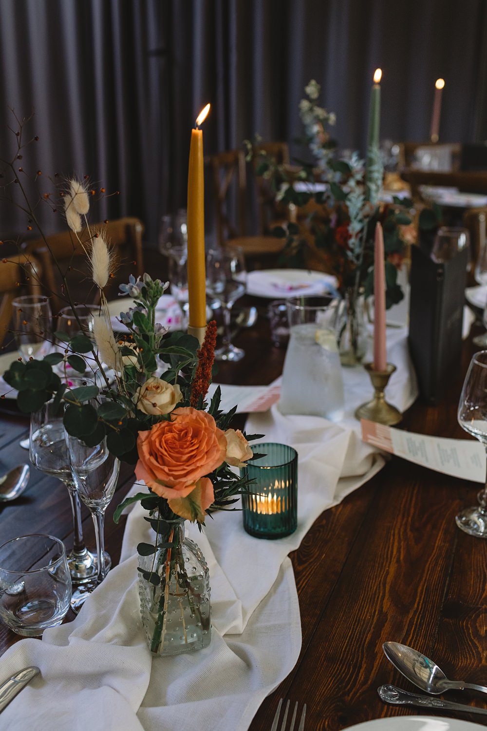 Table Set Up Flowers Candles Colourful Streamers Wedding Decor Louise Barry Photographer