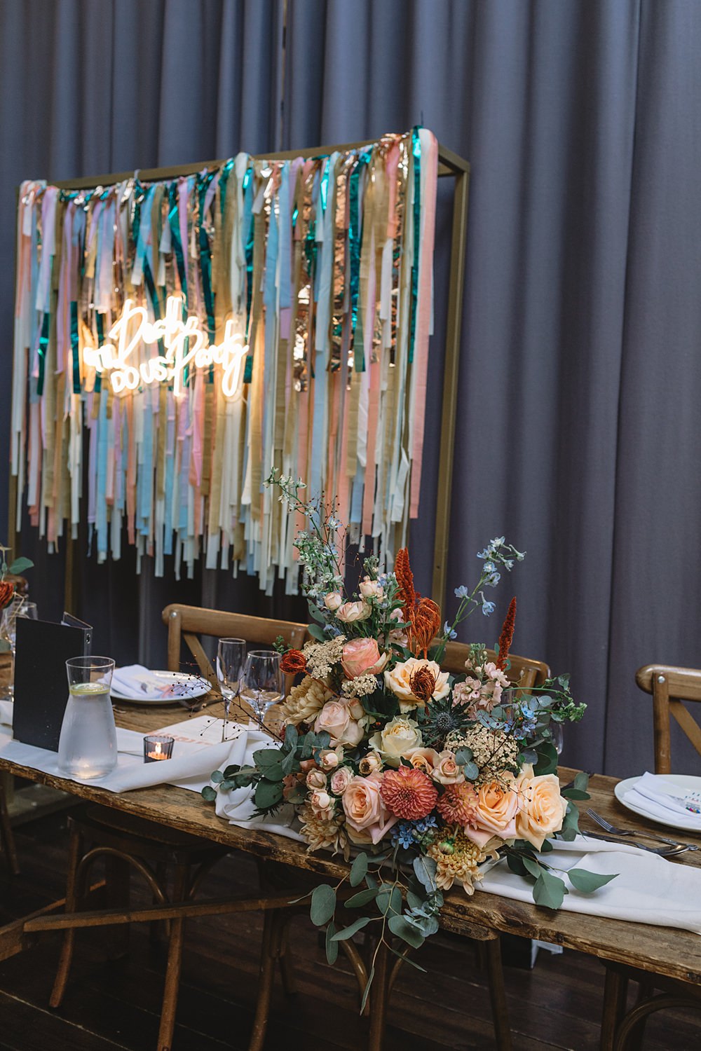 Table Set Up Flowers Candles Colourful Streamers Wedding Decor Louise Barry Photographer