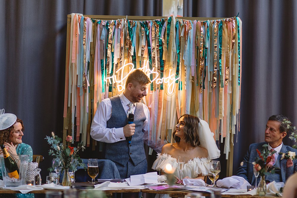 Ribbon Backdrop Neon Sign Streamers Wedding Decor Louise Barry Photographer