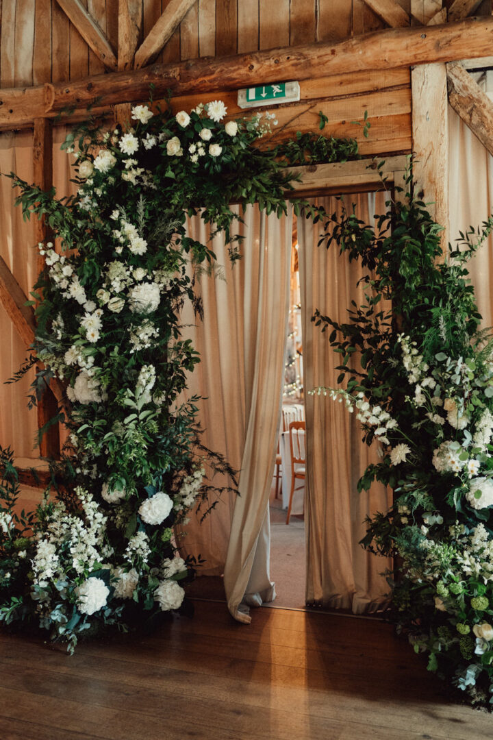 Wedding Arches Greenery White Flowers Emily & Steve Photography