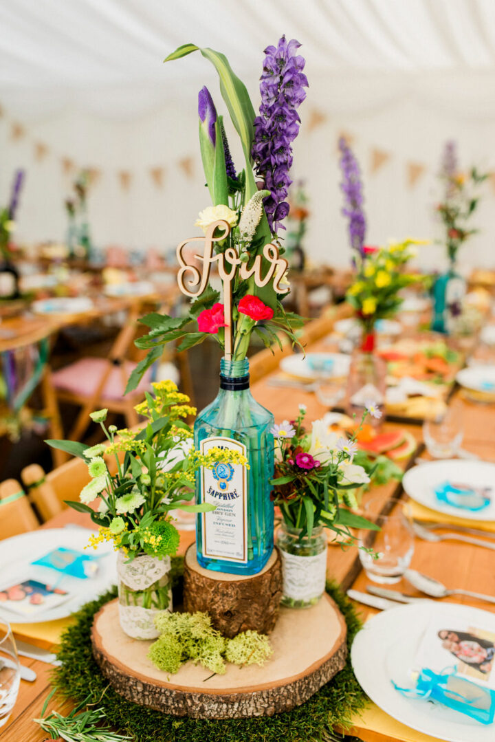 Wedding Idea Gin Bottle Flowers Emma B Photography