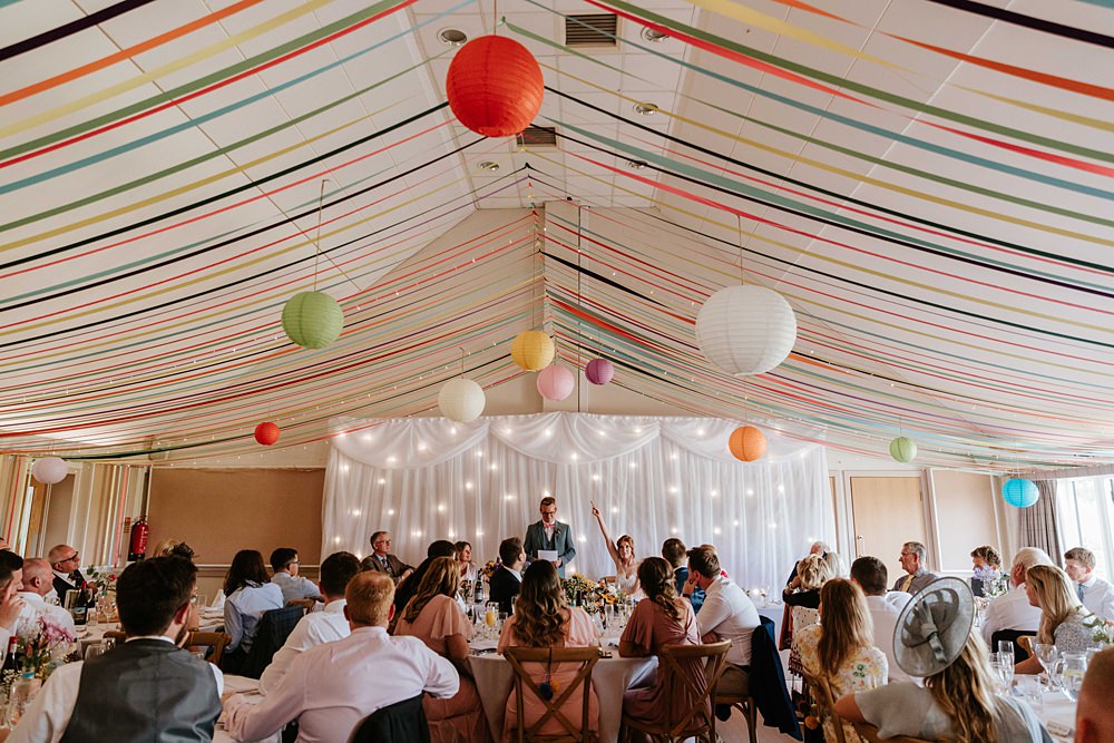 Streamers Lanterns Colourful Fairy Light Curtain Decor Yorkshire Village Hall Wedding Maddie Farris Photography