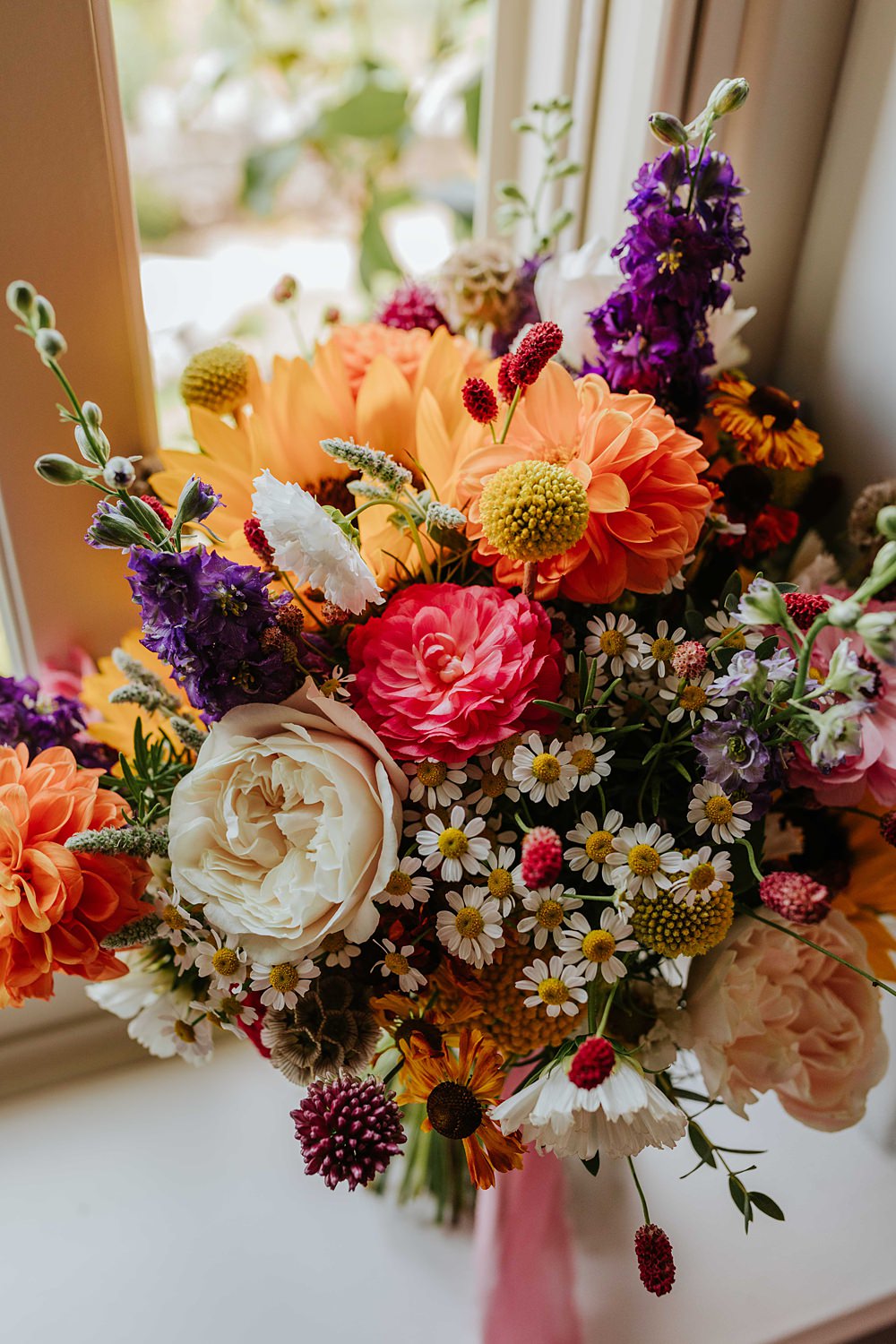 Colourful Bridal Bouquet Pink Yellow Sunflowers Daisy Yorkshire Village Hall Wedding Maddie Farris Photography