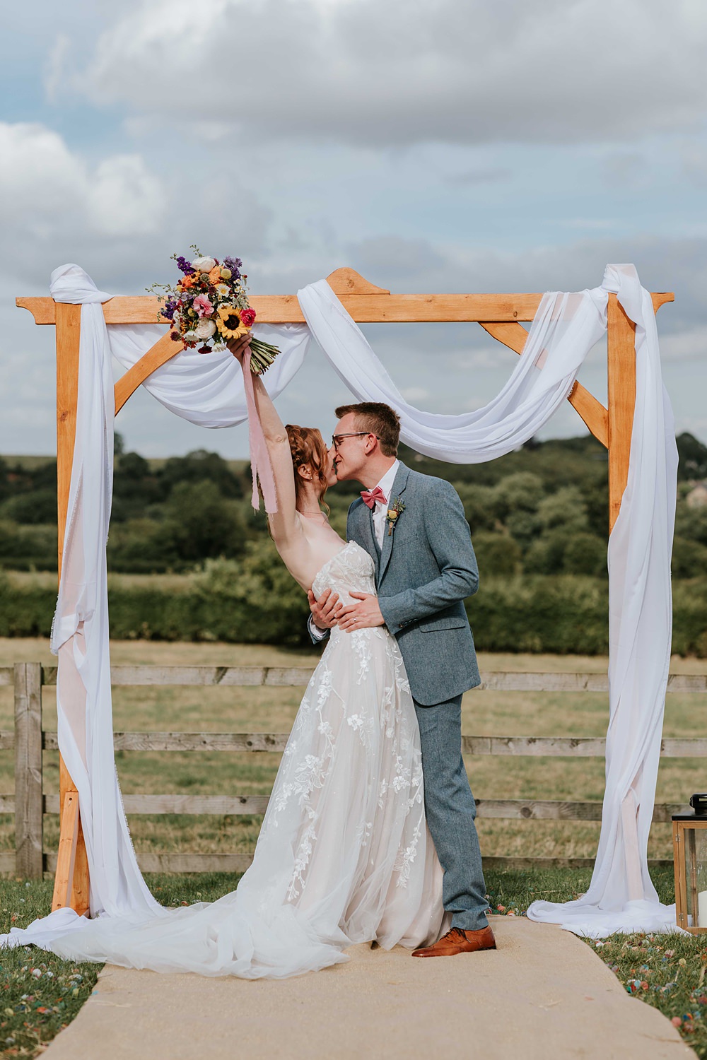 Yorkshire Village Hall Wedding Maddie Farris Photography Outdoor Ceremony Wooden Arch Backdrop