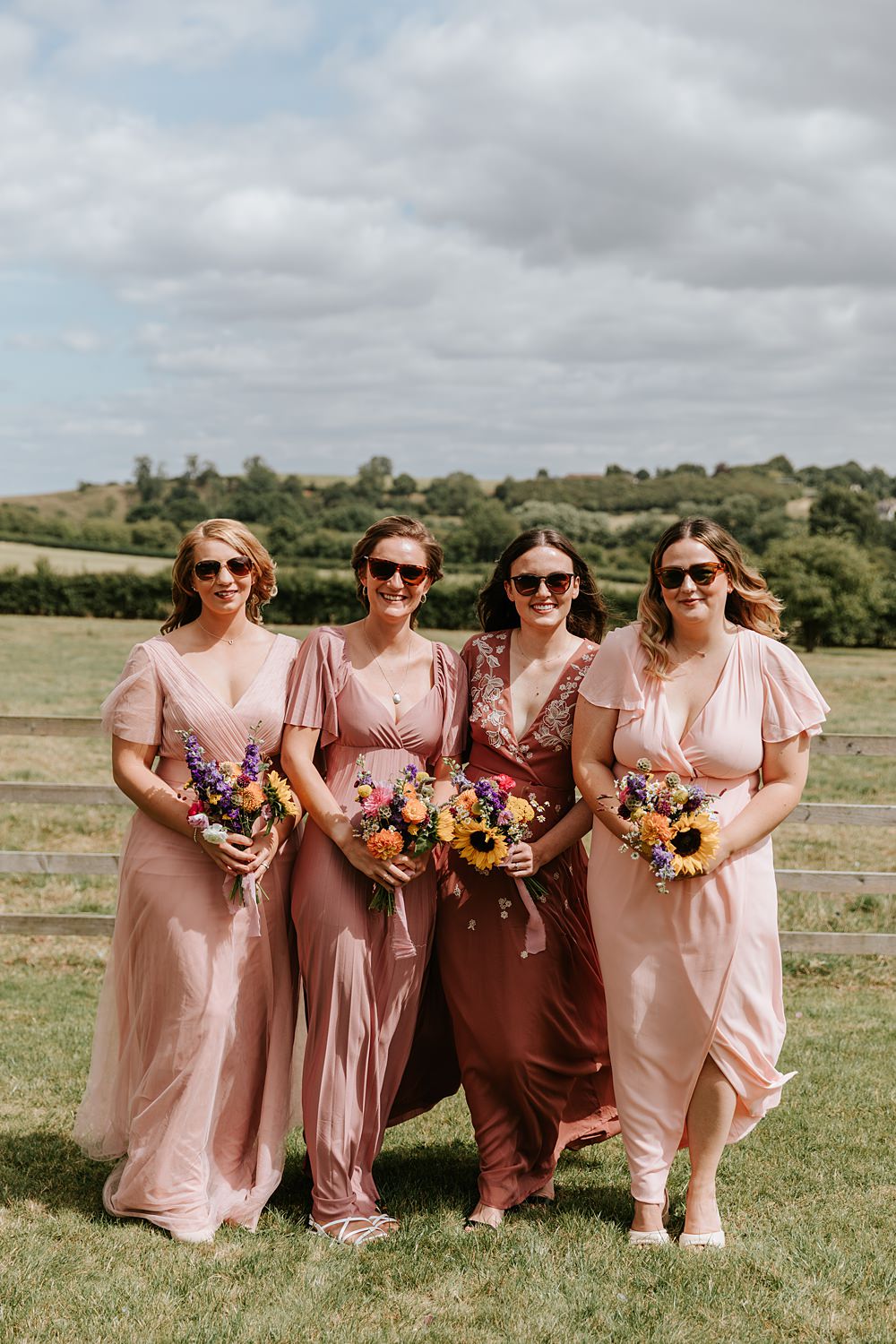 Long Pale Pink Bridesmaid Dresses Sunglasses Yorkshire Village Hall Wedding Maddie Farris Photography