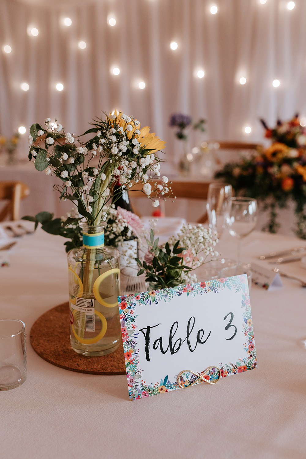 Table Centrepiece Cork Mat Flowers Bottle Yorkshire Village Hall Wedding Maddie Farris Photography
