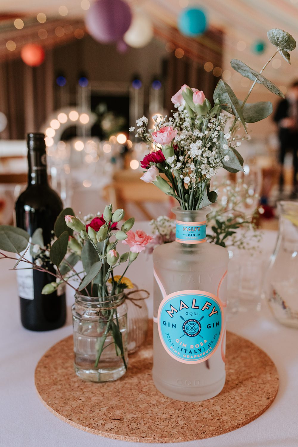 Table Centrepiece Cork Mat Flowers Bottle Yorkshire Village Hall Wedding Maddie Farris Photography