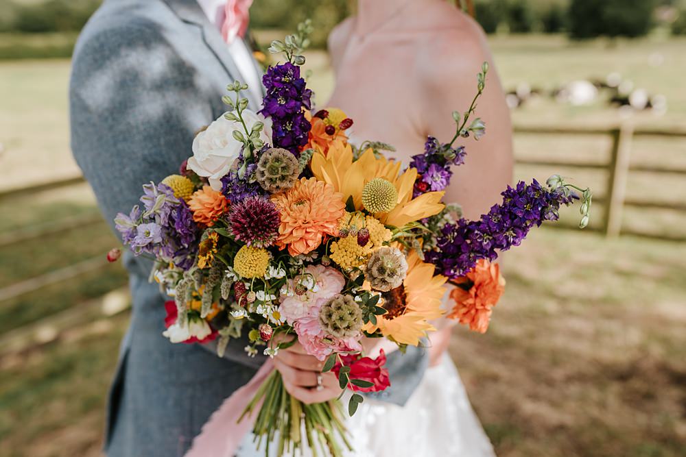 Colourful Bridal Bouquet Pink Yellow Sunflowers Daisy Yorkshire Village Hall Wedding Maddie Farris Photography 62