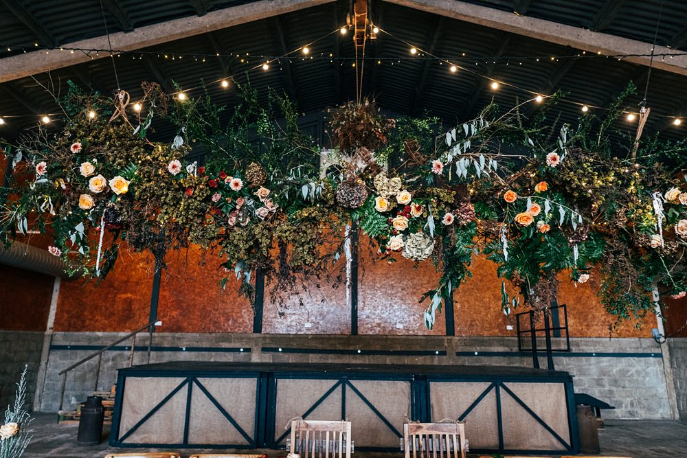 Hanging Flowers Reception Decor Autumn Harvest Wedding Three Flowers Photography