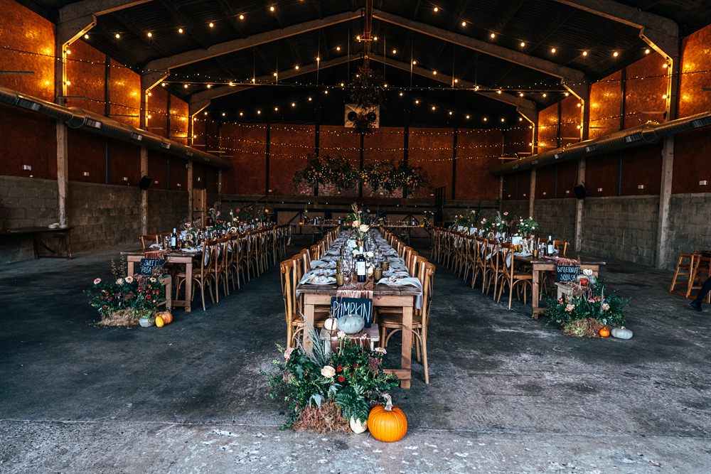 Barn Festoon Lights Long Tables Autumn Harvest Wedding Three Flowers Photography