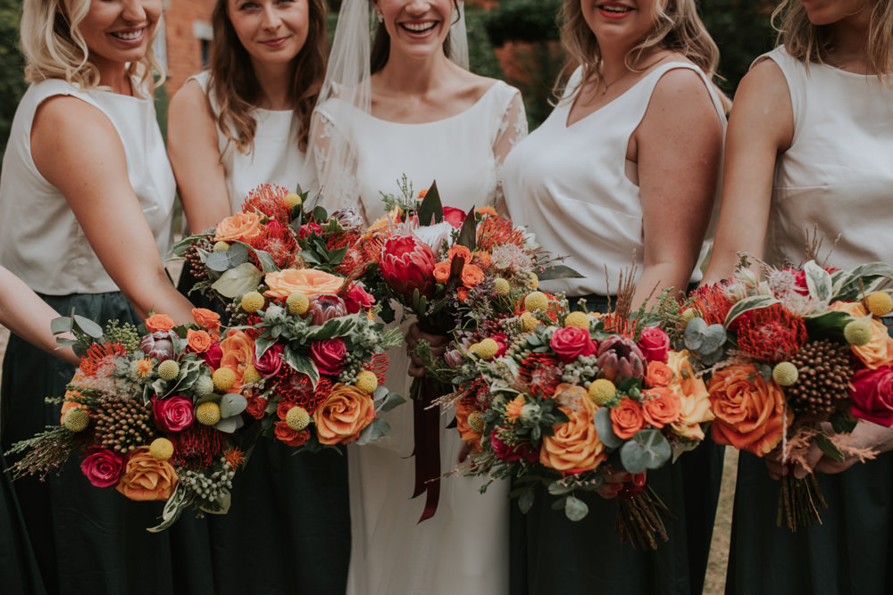 Bride Bridesmaid Bouquets Red Yellow Clear Roof Marquee Wedding Grace Pham Photography