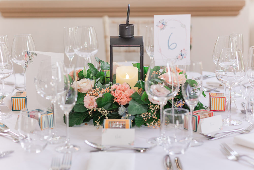 Centrepiece Flowers Pink Orange Rose Lantern Crowcombe Court Wedding James and Kerrie Photography
