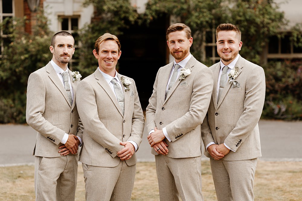 Pale Grey Tweed Suit Groom Groomsmen Sage Green Tie Lainston House Wedding Chloe Caldwell Photography