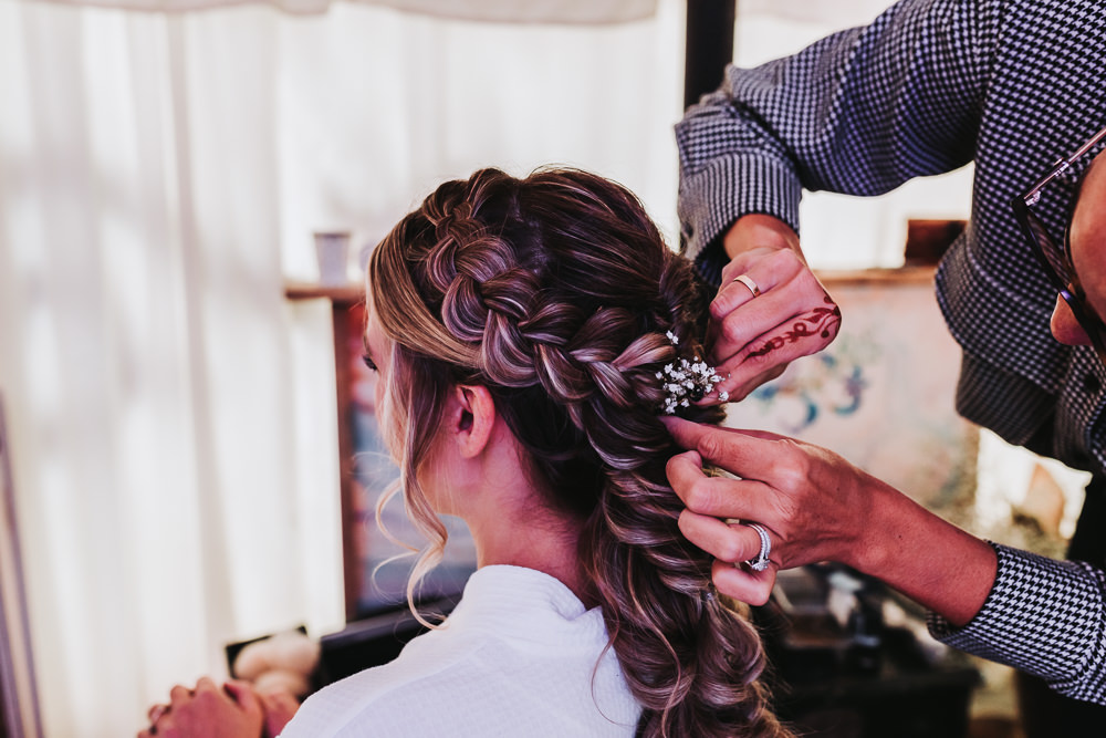 Bride Hairstyle Braid Plait Flowers Yurt Village Wedding Mollie McAusland Photography