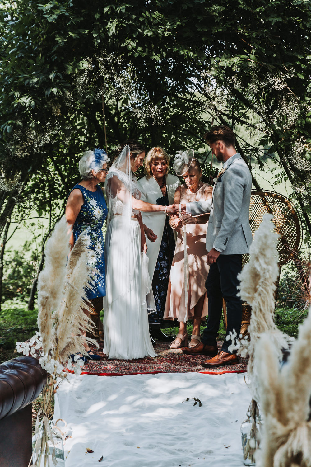 Willow Arch Ceremony Rug Aisle Pampas Grass Yurt Village Wedding Mollie McAusland Photography