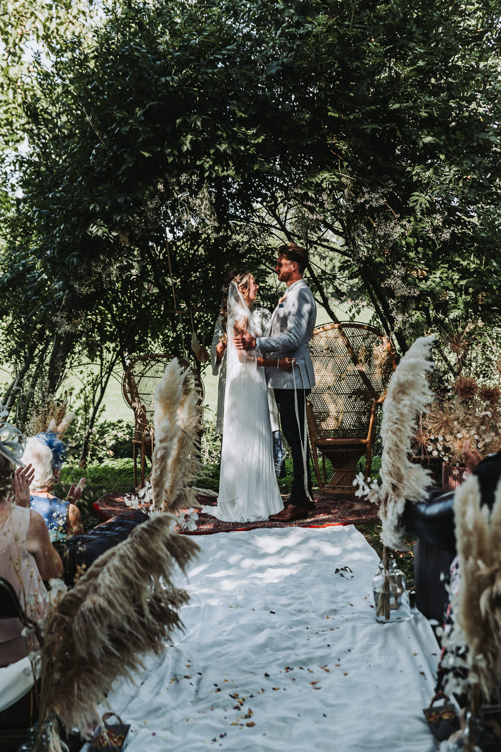 Willow Arch Ceremony Rug Aisle Yurt Village Wedding Mollie McAusland Photography
