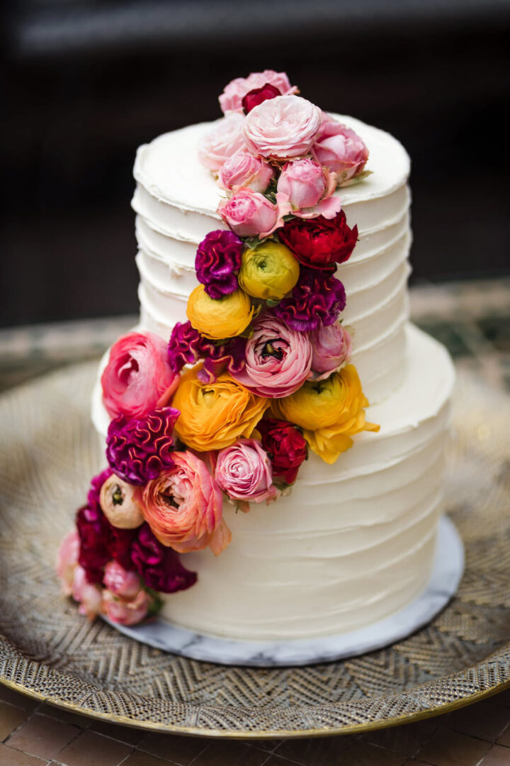 2 Tier Wedding Cake Flower Cascade Laura May Photography