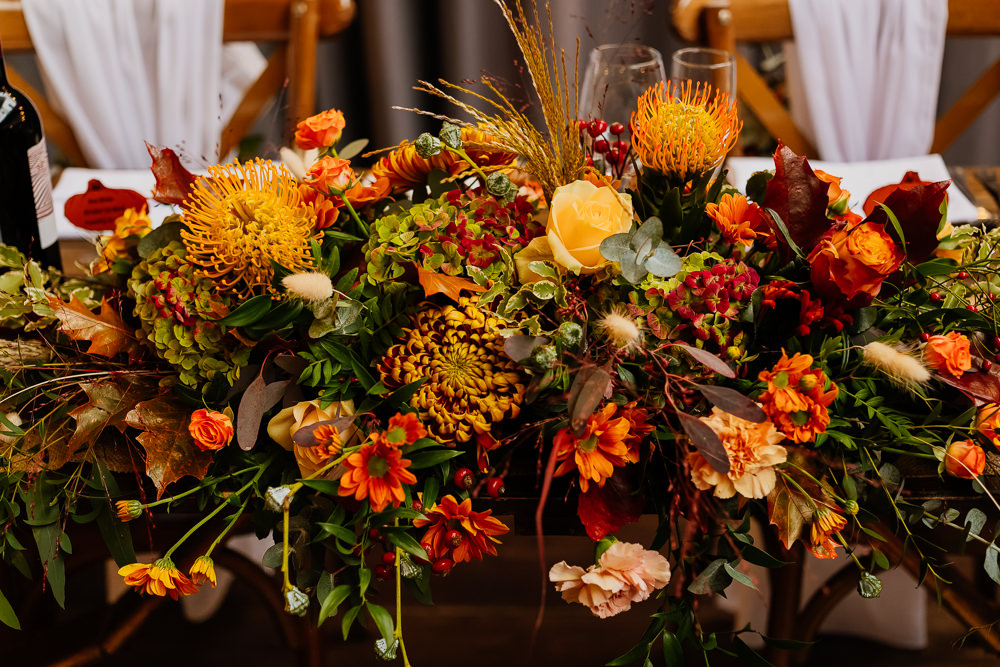 Top Table Flowers Orange Red Autumnal Garden Wedding Jenna Kathleen Photographer