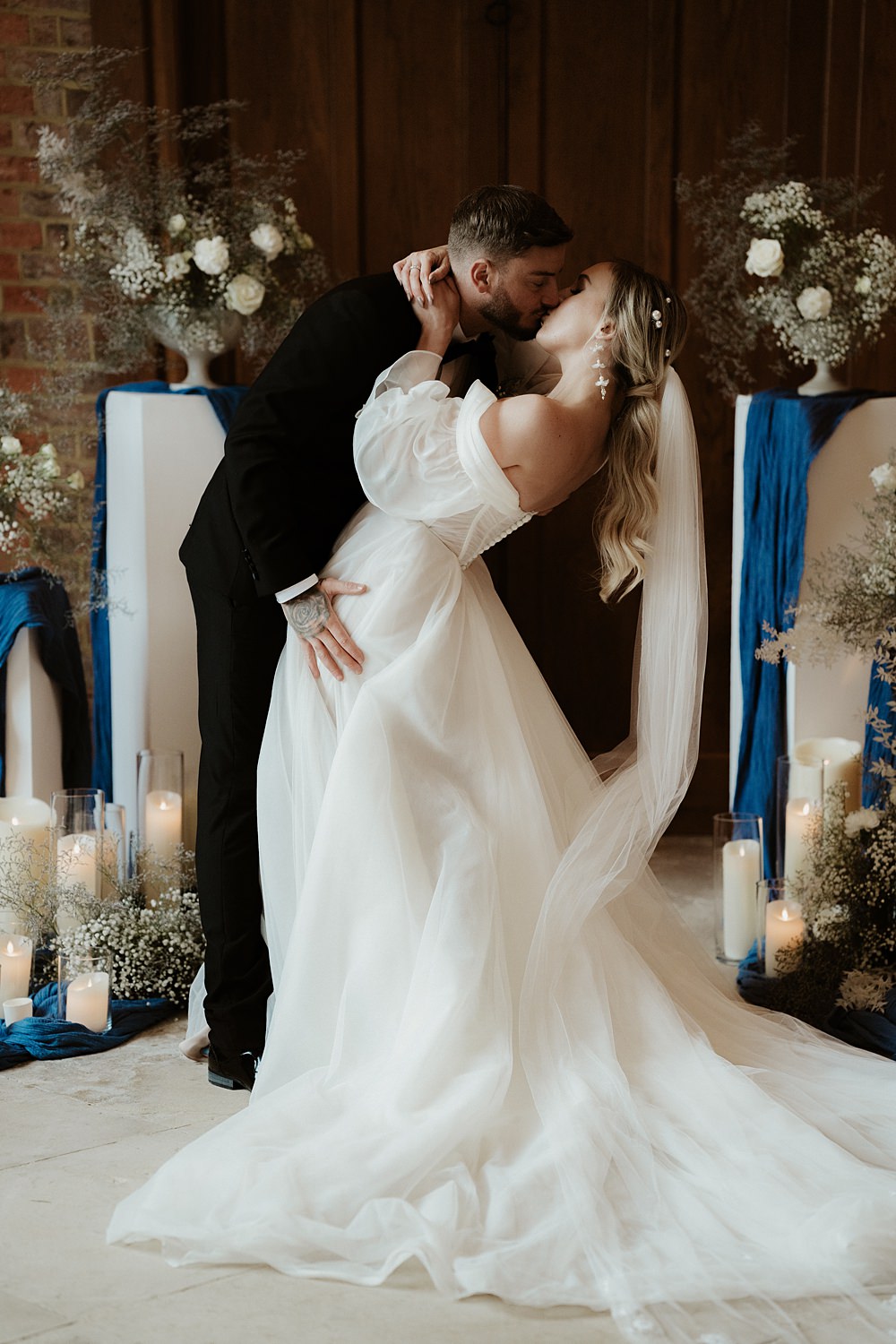 Ceremony Backdrop Pillars Flowers Candles Blue White Wedding Ideas Natalie Silvester Photography