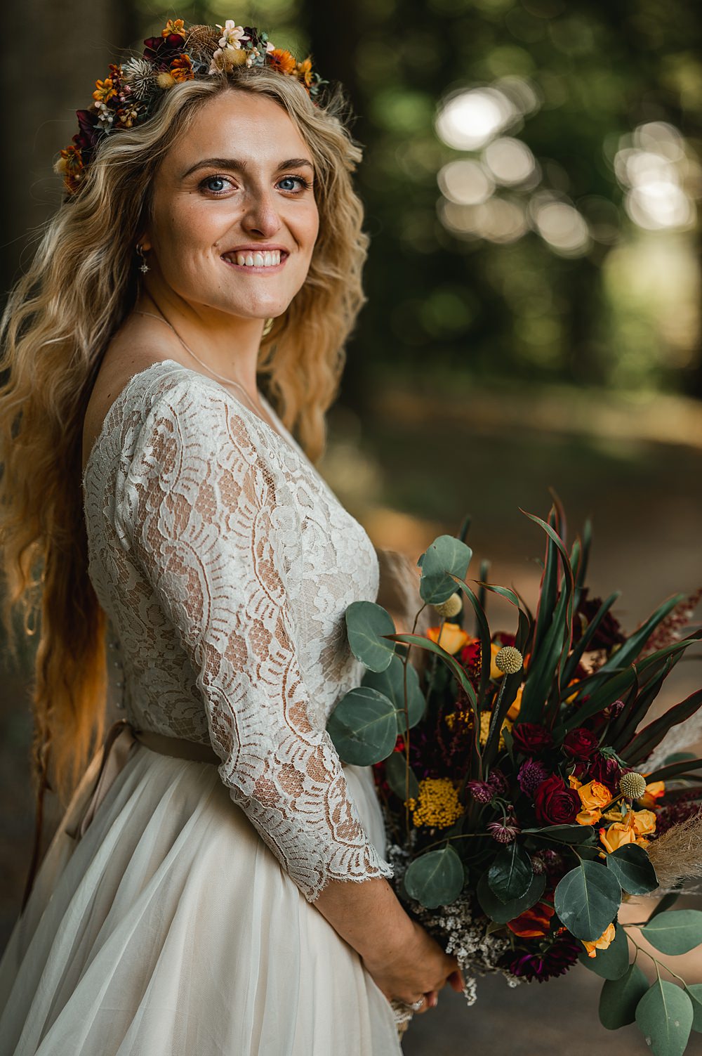 Bouquet Flowers Bride Red Yellow Greenery Carreglwyd Estate Wedding Amy and Omid Photography