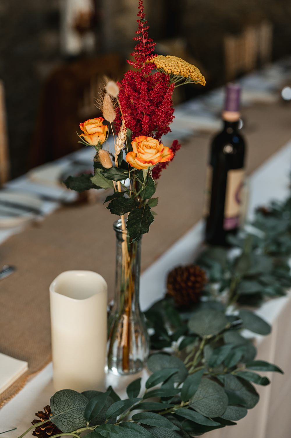 Vase Flowers Red Yellow Carreglwyd Estate Wedding Amy and Omid Photography