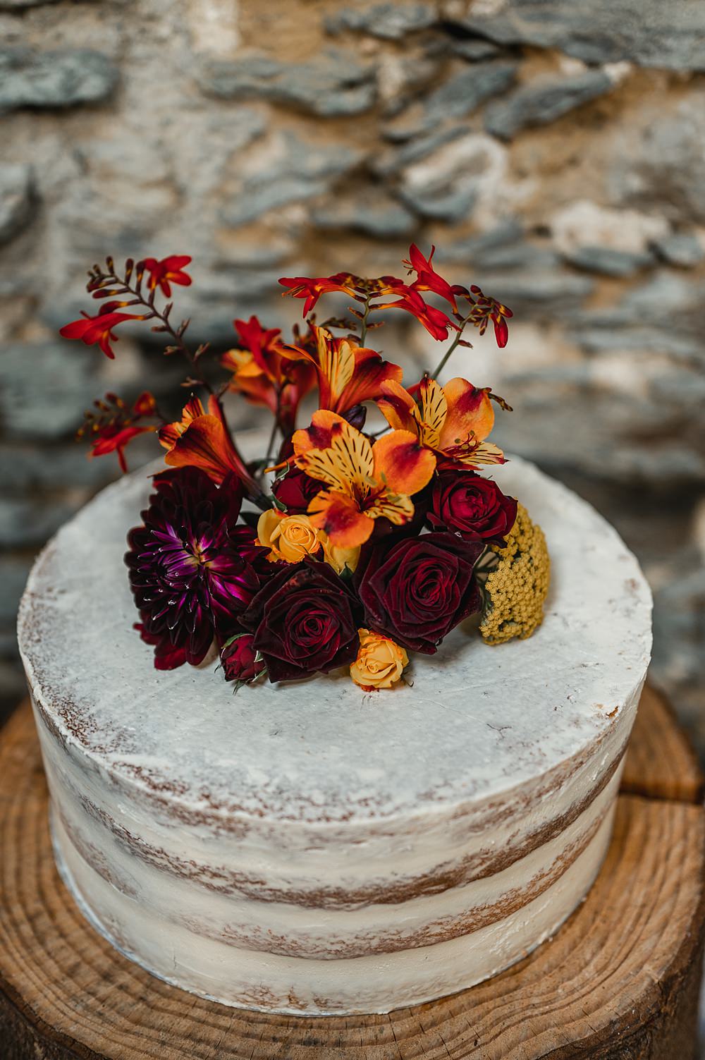 Single Tier Semi Naked Cake Flowers Carreglwyd Estate Wedding Amy and Omid Photography