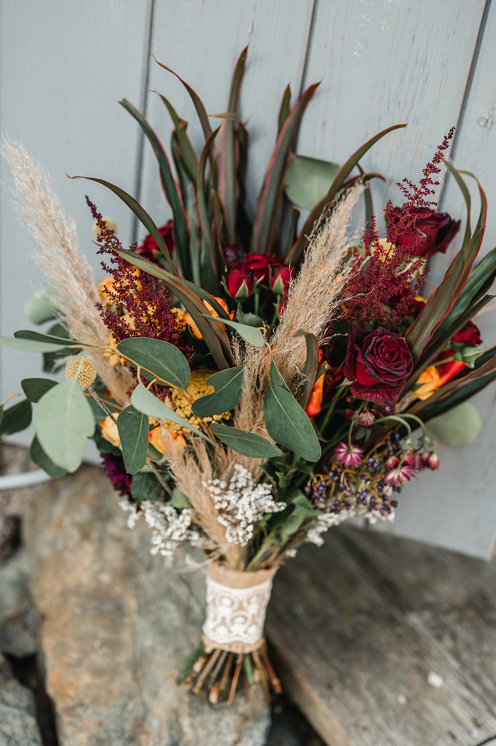 Bouquet Flowers Bride Red Yellow Greenery Pampas Carreglwyd Estate Wedding Amy and Omid Photography
