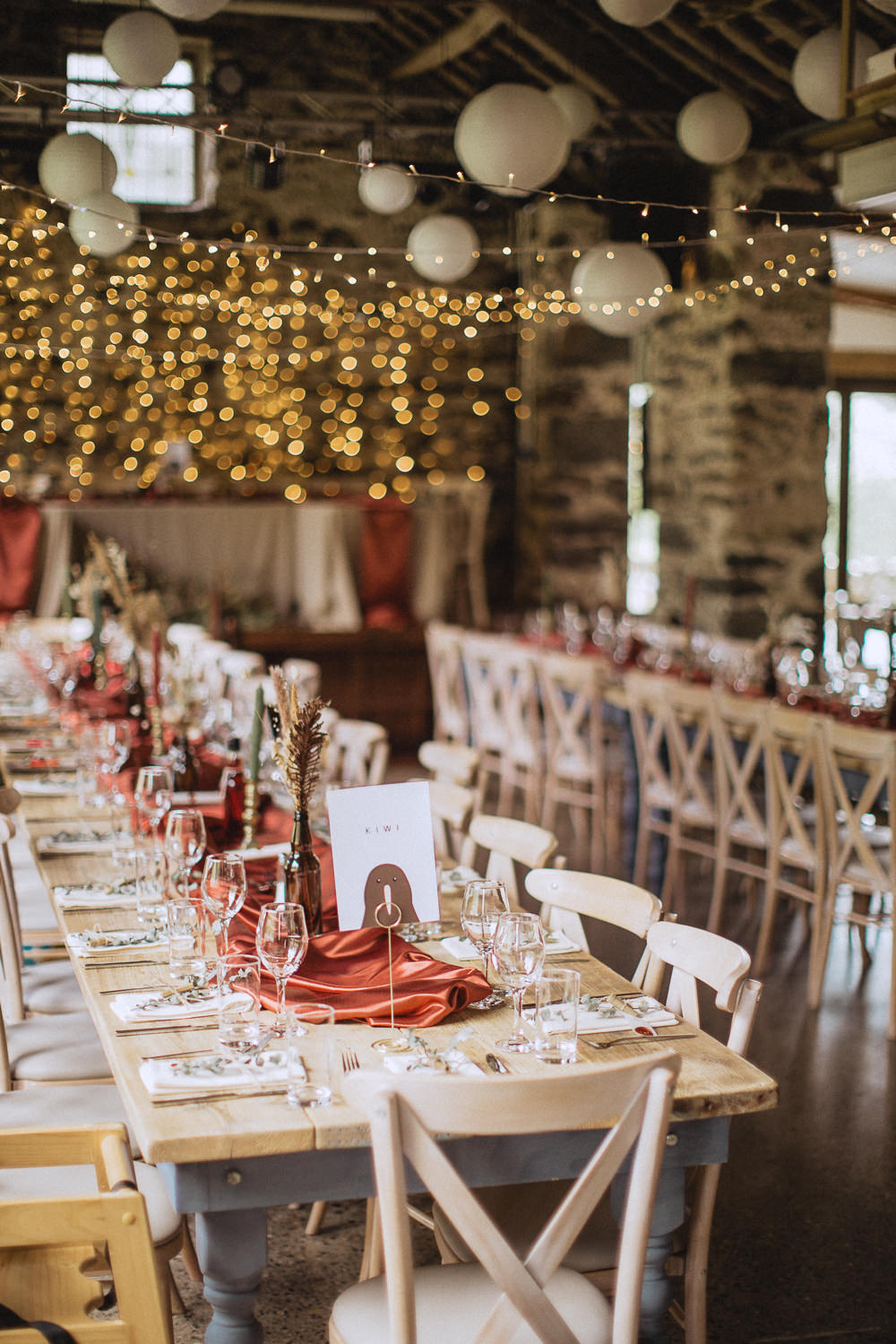Long Table Decor Rust Runner Candles Dried Grasses Lanterns Fairy Lights Llyn Gwynant Barns Wedding Fox and Bear Photography