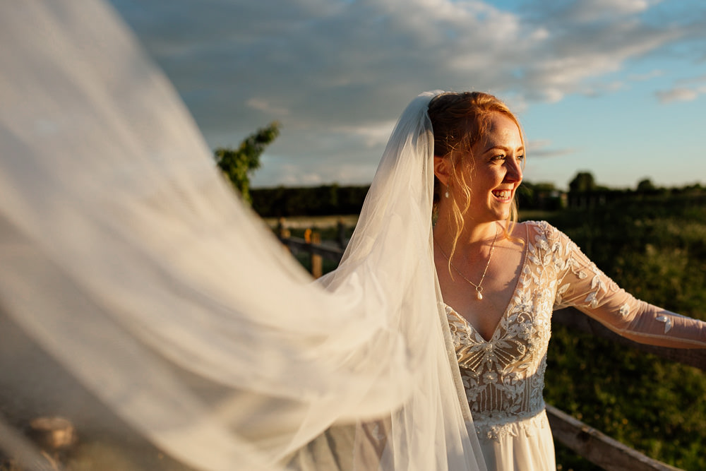 Floral Gown Sheer Sleeves Bridal Justin Alexander Veil Oddhouse Farm Wedding Anna Rose Heaton Photography
