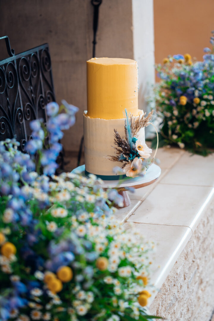 Two Tier Wedding Cake Yellow Blue Flower Hoop Emily Collett Photography