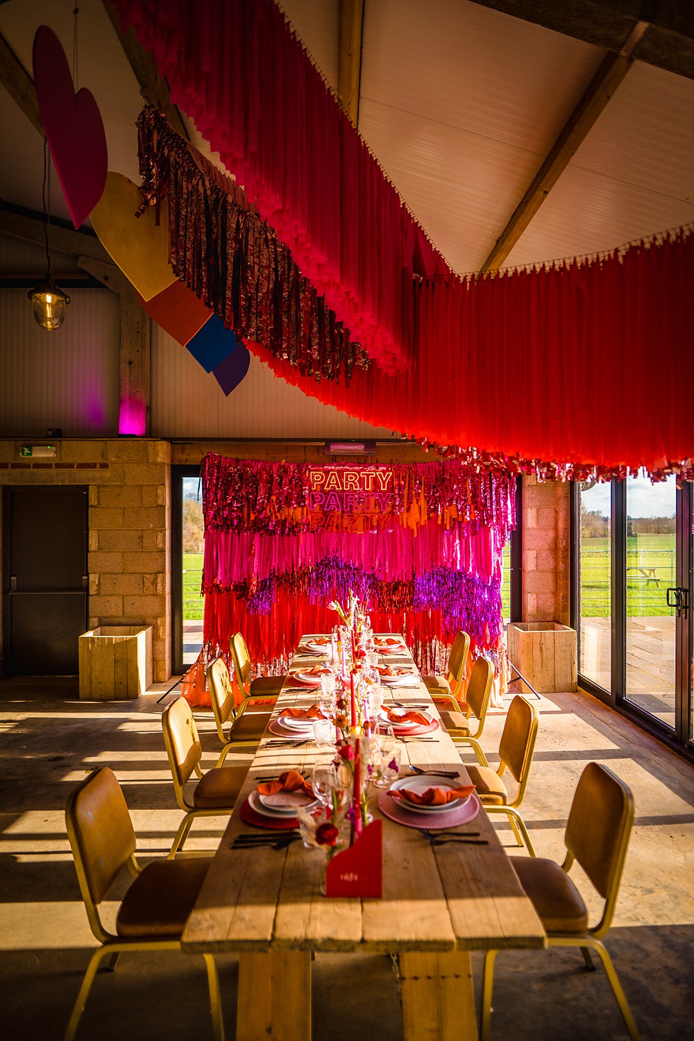 Table Decor Red Pink Streamers Neon Sign Backdrop WedShed Wedding Ideas Photography By Vicki