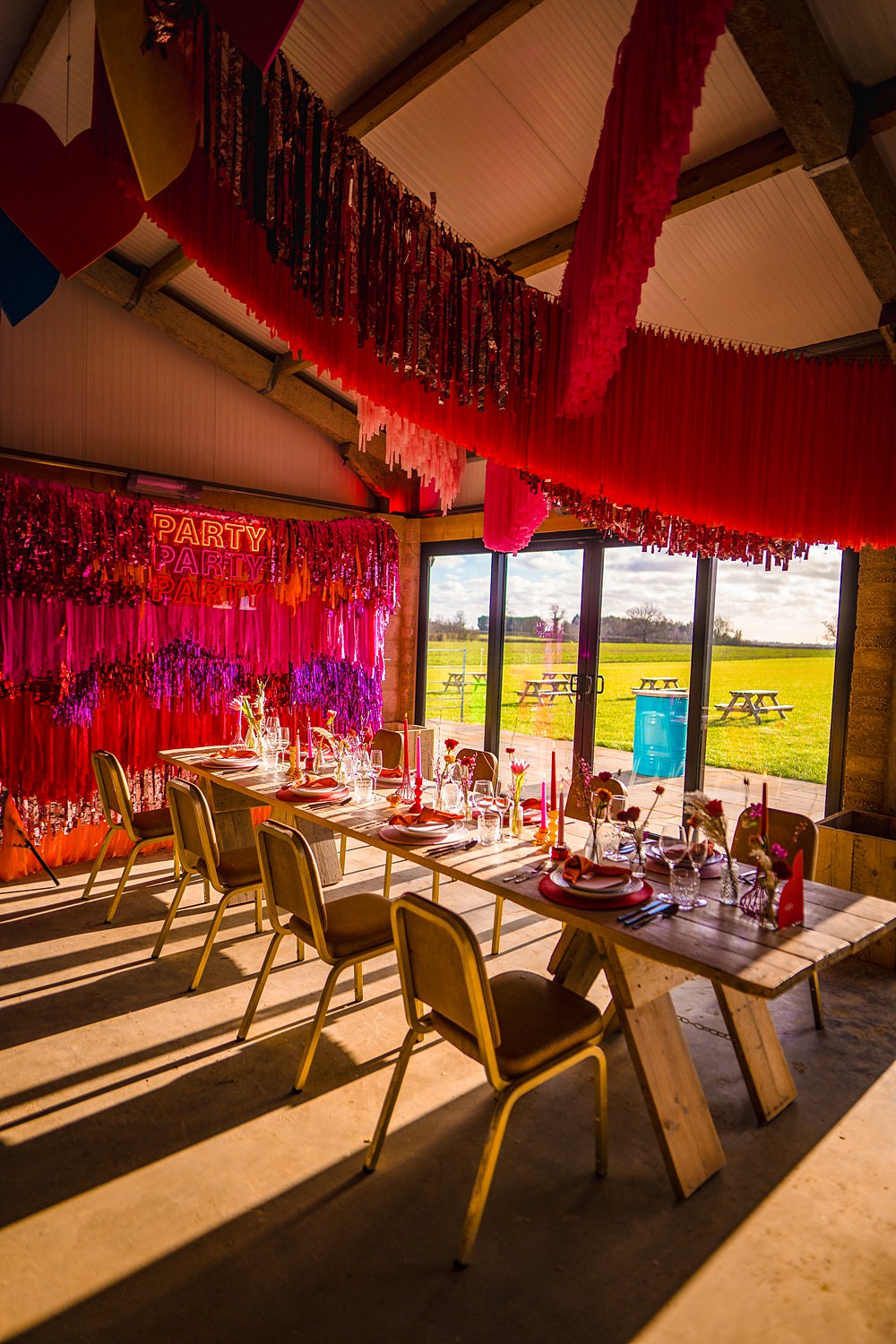 Table Decor Red Pink Streamers Neon Sign Backdrop WedShed Wedding Ideas Photography By Vicki