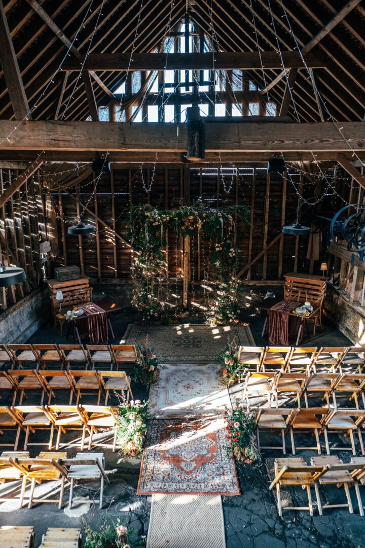 Wedding Aisle Decor Idea Rugs Flowers Three Flowers Photography