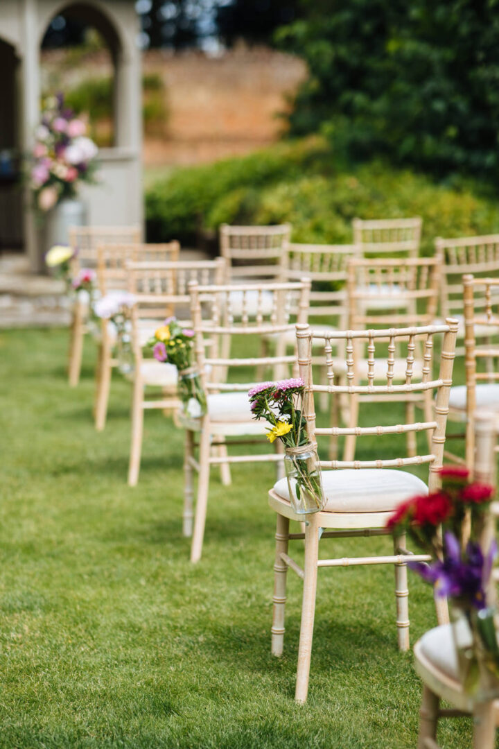 Wedding Aisle Decor Jar Flowers Laura Debourde Photography