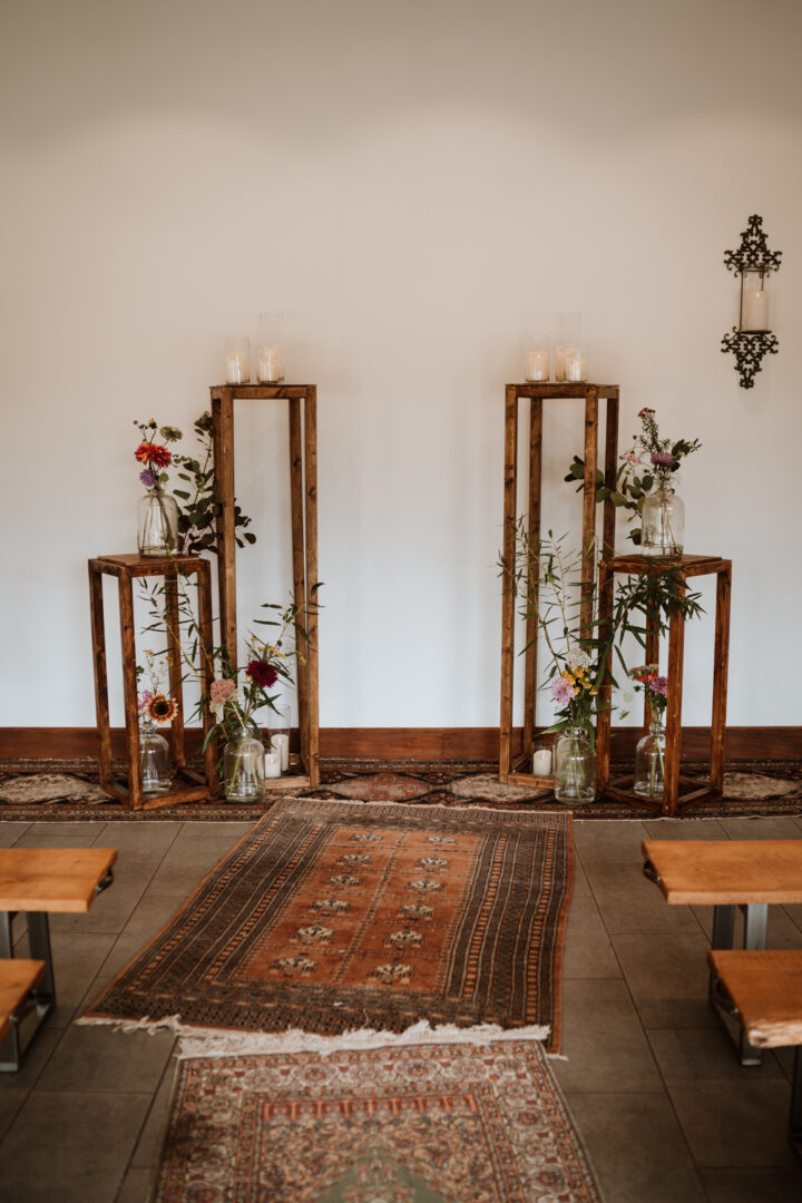 Wedding Aisle Decor Wooden Pillars Flowers Nicola Dawson Photography