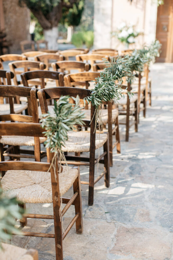 Wedding Aisle Decorations Greenery Chairs HannaMonika Wedding Photography
